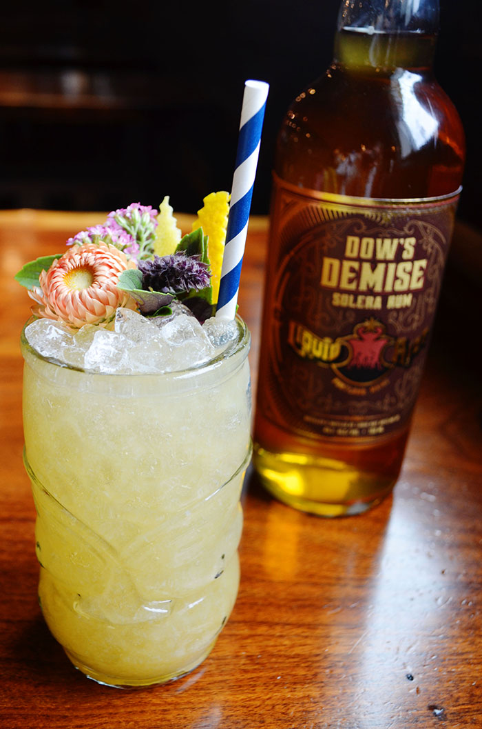 Fog Cutter cocktail with Dow's Demise Rum bottle